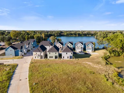 a view of a house with outdoor space and sitting area