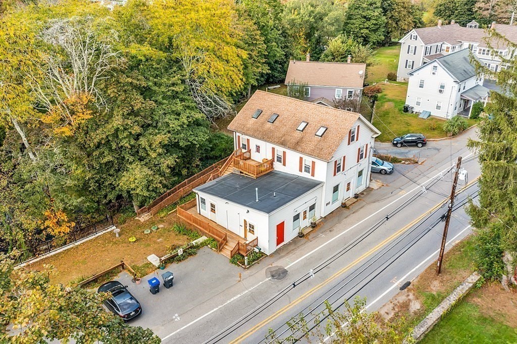 479-483 Gleasondale Road Stow, MA 01775 - Photo 1 of 40 an aerial view of a house with a garden