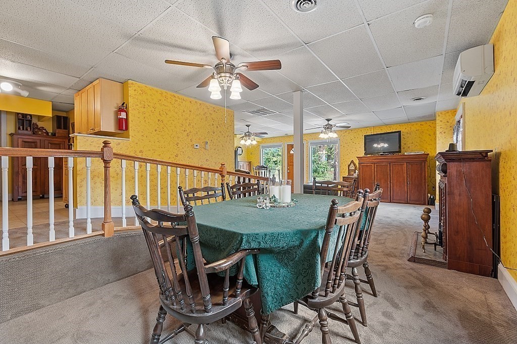 479-483 Gleasondale Road Stow, MA 01775 - Photo 16 of 40 a view of a dining room with furniture