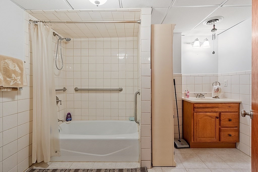 479-483 Gleasondale Road Stow, MA 01775 - Photo 19 of 40 a bathroom with a bathtub and a sink