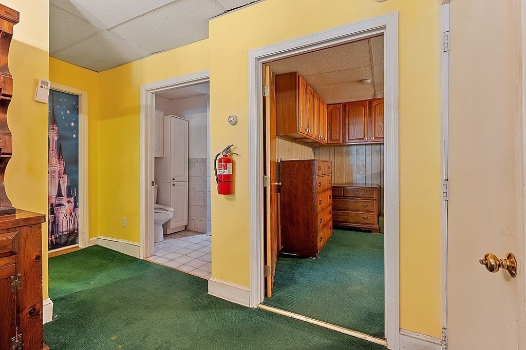 479-483 Gleasondale Road Stow, MA 01775 - Photo 20 of 40 a view of a bathroom with a sink and a mirror