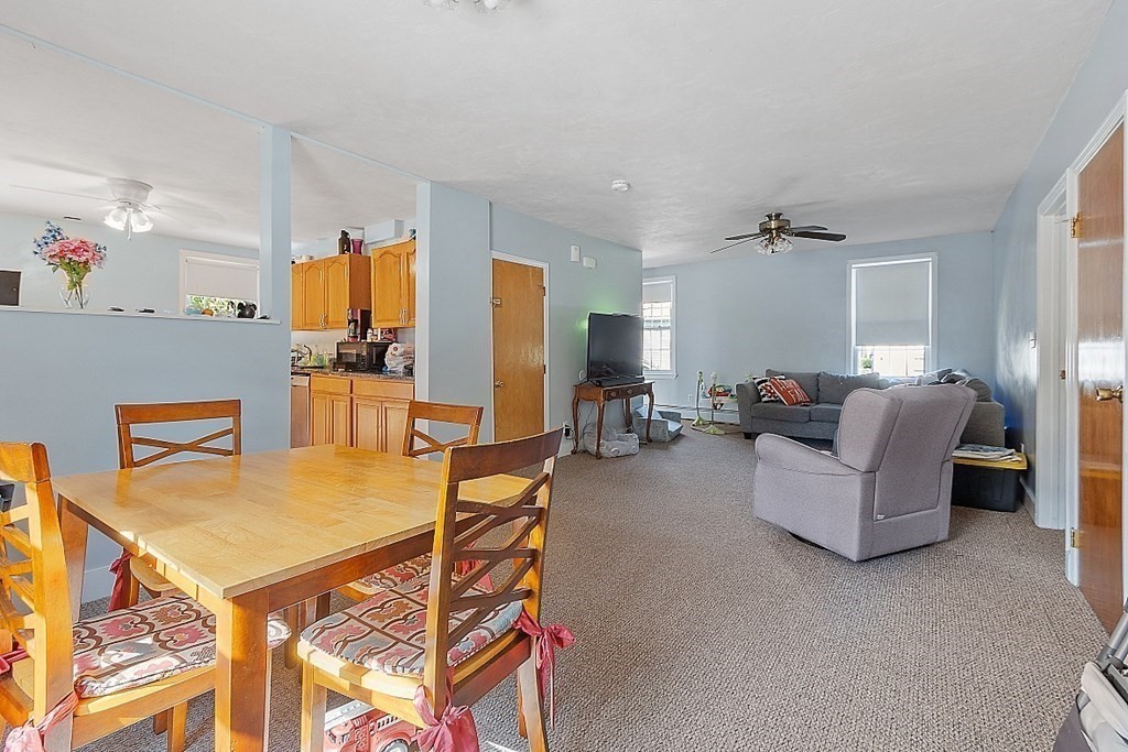 479-483 Gleasondale Road Stow, MA 01775 - Photo 3 of 40 a living room with furniture and a table