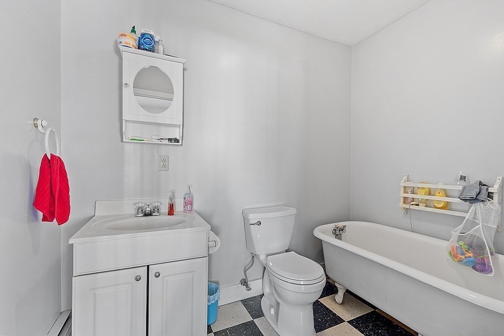 479-483 Gleasondale Road Stow, MA 01775 - Photo 9 of 40 a bathroom with a sink toilet and a mirror
