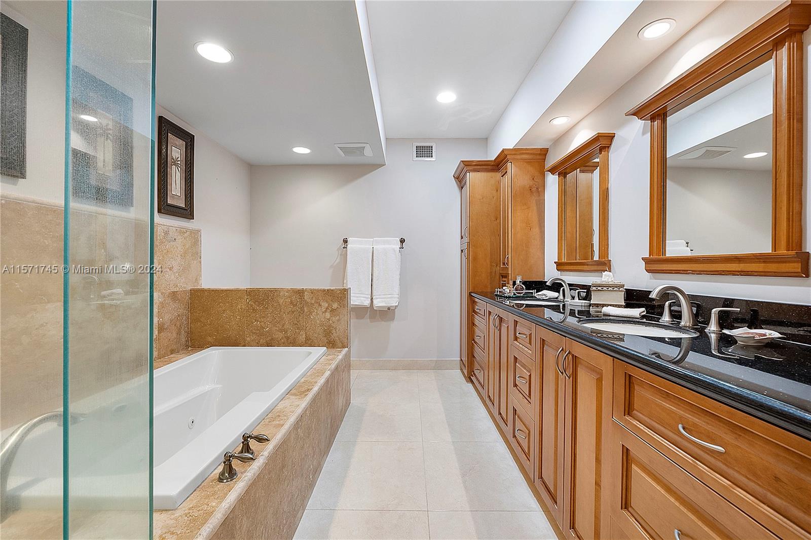 1200 Cocoanut Road Boca Raton, FL 33432 - Photo 14 of 25 a large kitchen with a large window and stainless steel appliances