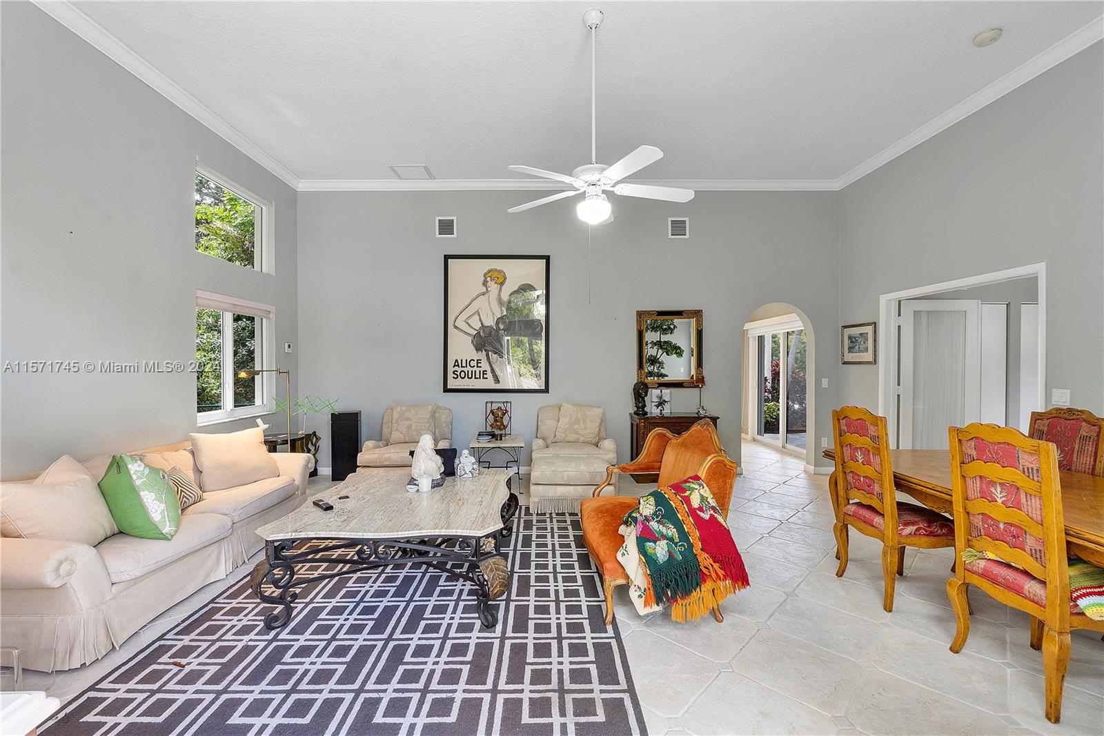1200 Cocoanut Road Boca Raton, FL 33432 - Photo 21 of 25 a living room with furniture a rug and a window