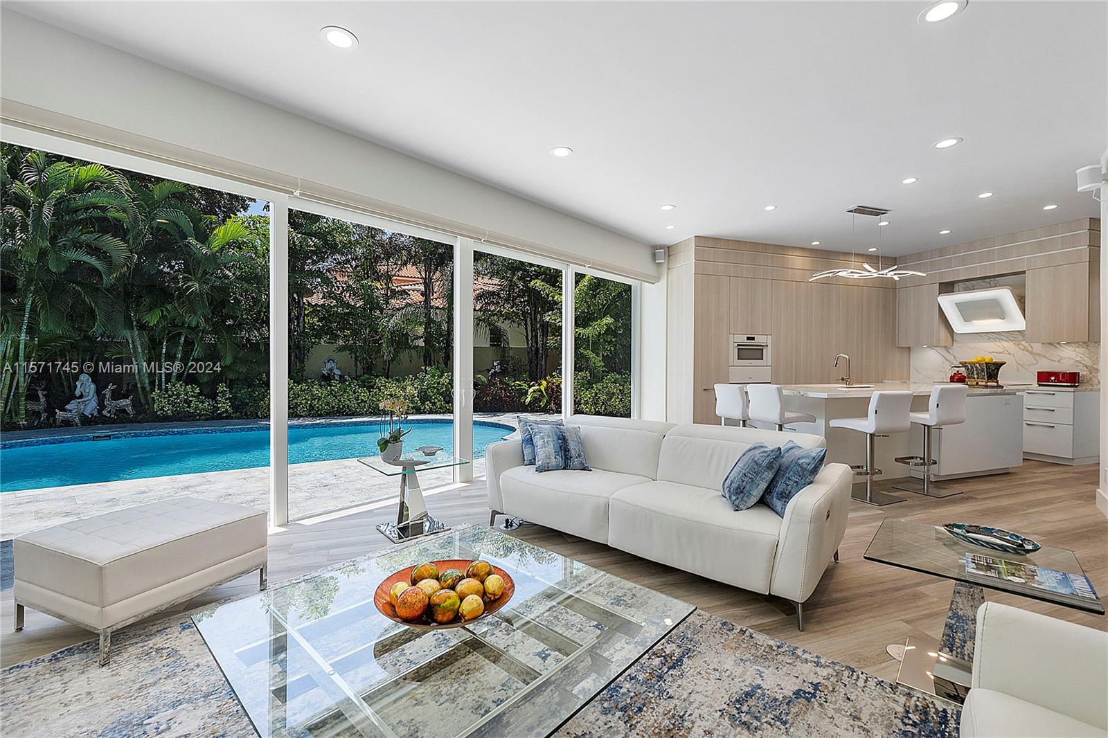 1200 Cocoanut Road Boca Raton, FL 33432 - Photo 9 of 25 a living room with furniture and a large window