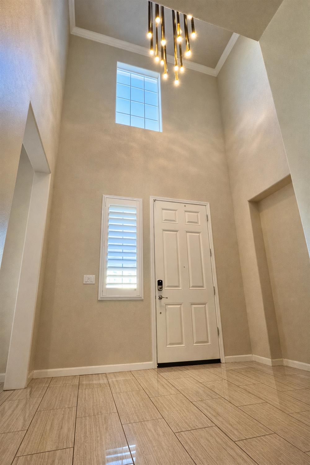2557 Creek Hollow Road Rocklin, CA 95765 - Photo 4 of 27 an empty room with kitchen view