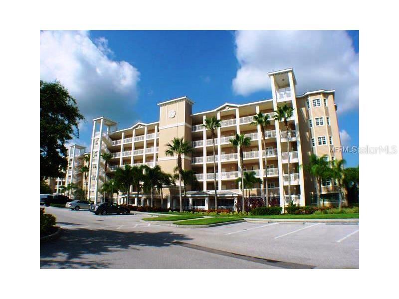 7194 Key Haven Road, Unit 201 Seminole, FL 33777 - Photo 1 of 1 a building with a street sign on the side of it