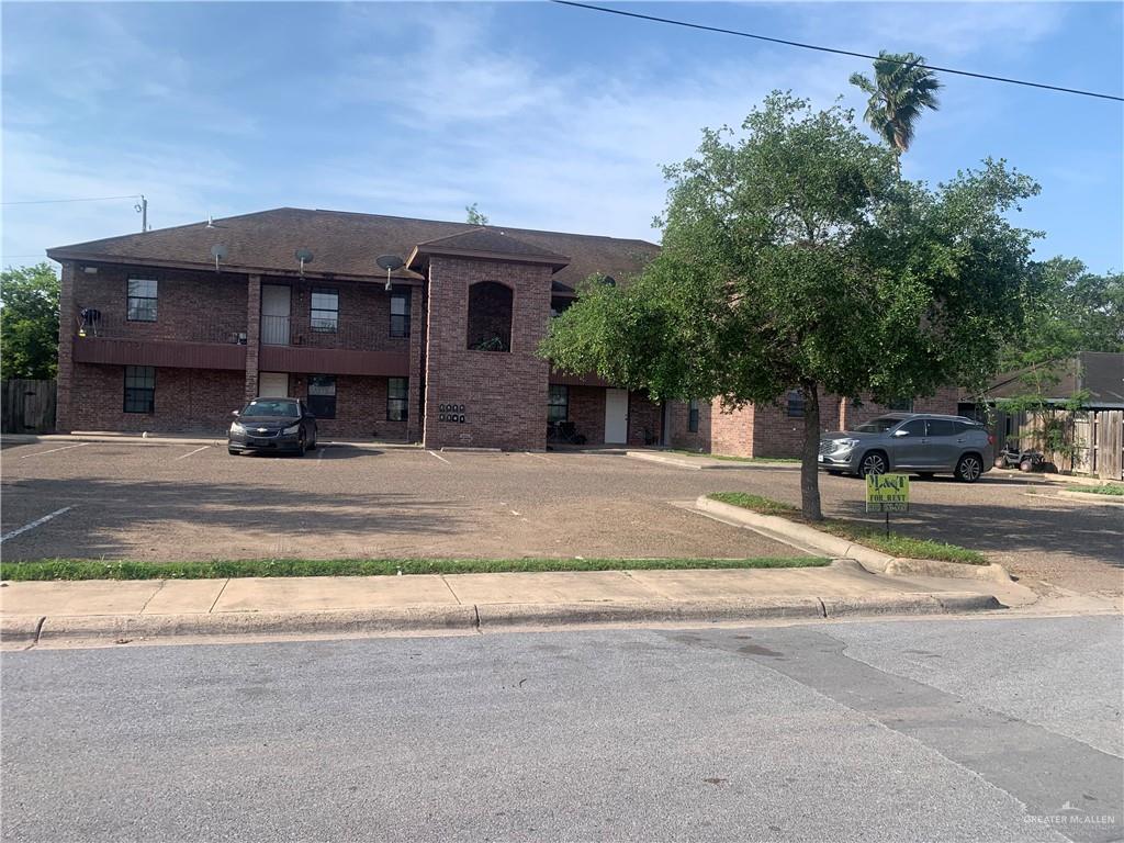 a view of a house with a street