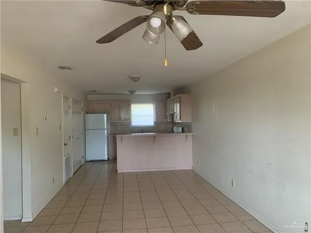a view of a kitchen with a sink and dishwasher in kitchen