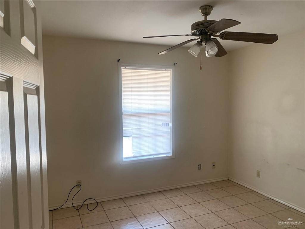 918 East Preston Avenue, Unit 4 Pharr, TX 78577 - Photo 6 of 10 a view of a room that has a window in it