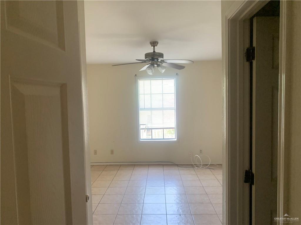 918 East Preston Avenue, Unit 4 Pharr, TX 78577 - Photo 7 of 10 a view of an empty room with a window