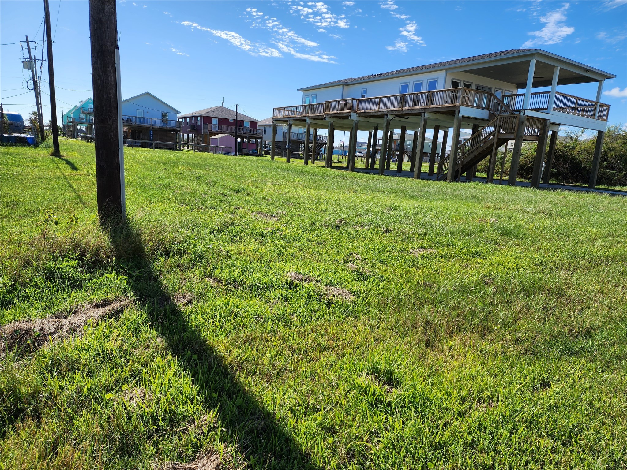 0 Texas Street Surfside Beach, TX 77541 - Photo 5 of 5 a view of a backyard of the house