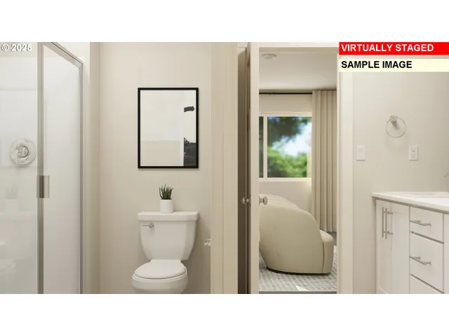 a black and white photo of a bathroom