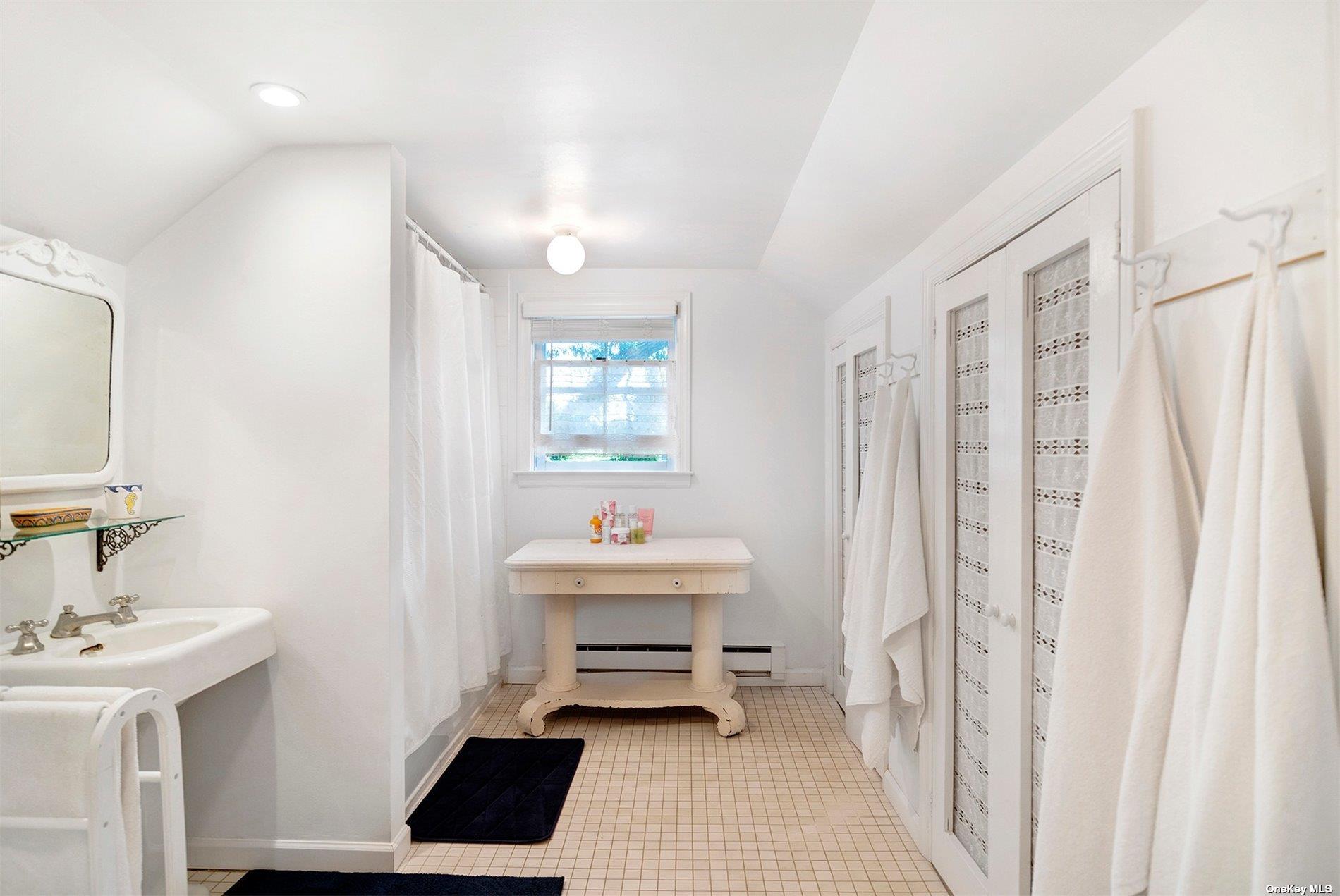 640 Orchard Street New Suffolk, NY 11956 - Photo 21 of 30 a room with a sink and a window
