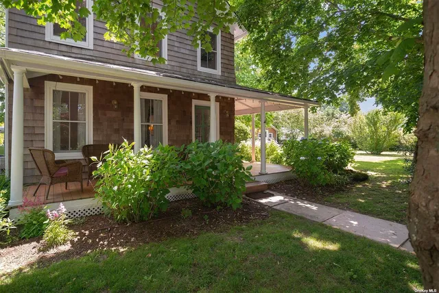 a view of a house with a garden