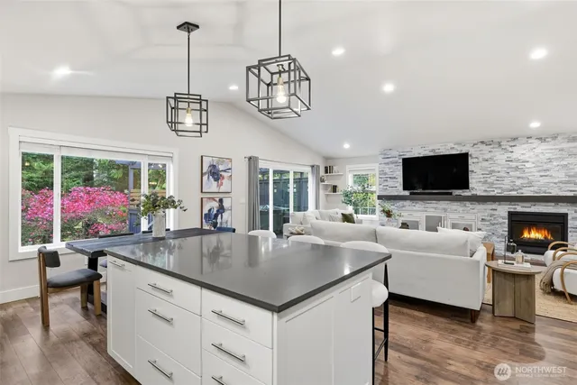 a living room with furniture and flat screen tv