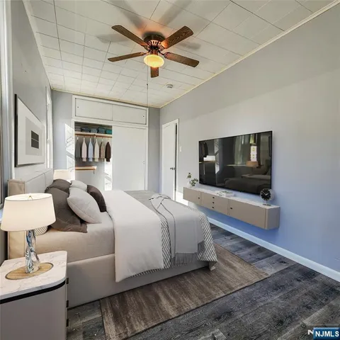 a living room with a couch and a flat screen tv