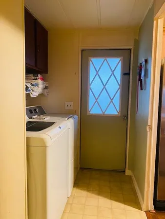a view of storage and utility room