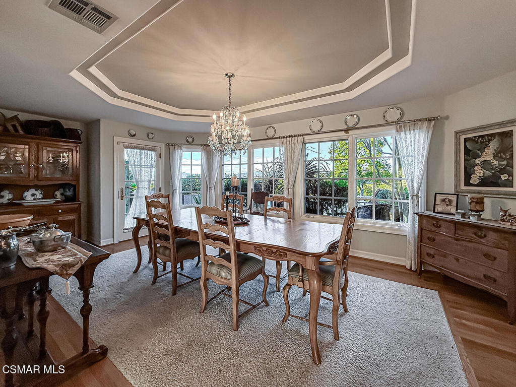 24525 Desert Avenue Newhall, CA 91321 - Photo 12 of 76 a view of a dining room with furniture window and outside view