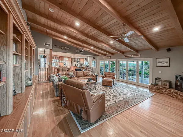 a kitchen with stainless steel appliances granite countertop a stove and a microwave