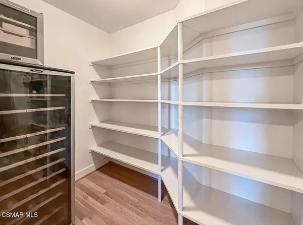 a bedroom with a bed and a fireplace