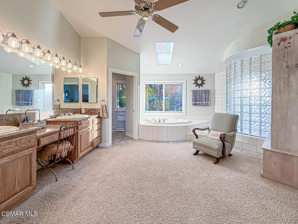 24525 Desert Avenue Newhall, CA 91321 - Photo 55 of 76 a living room with furniture and a chandelier