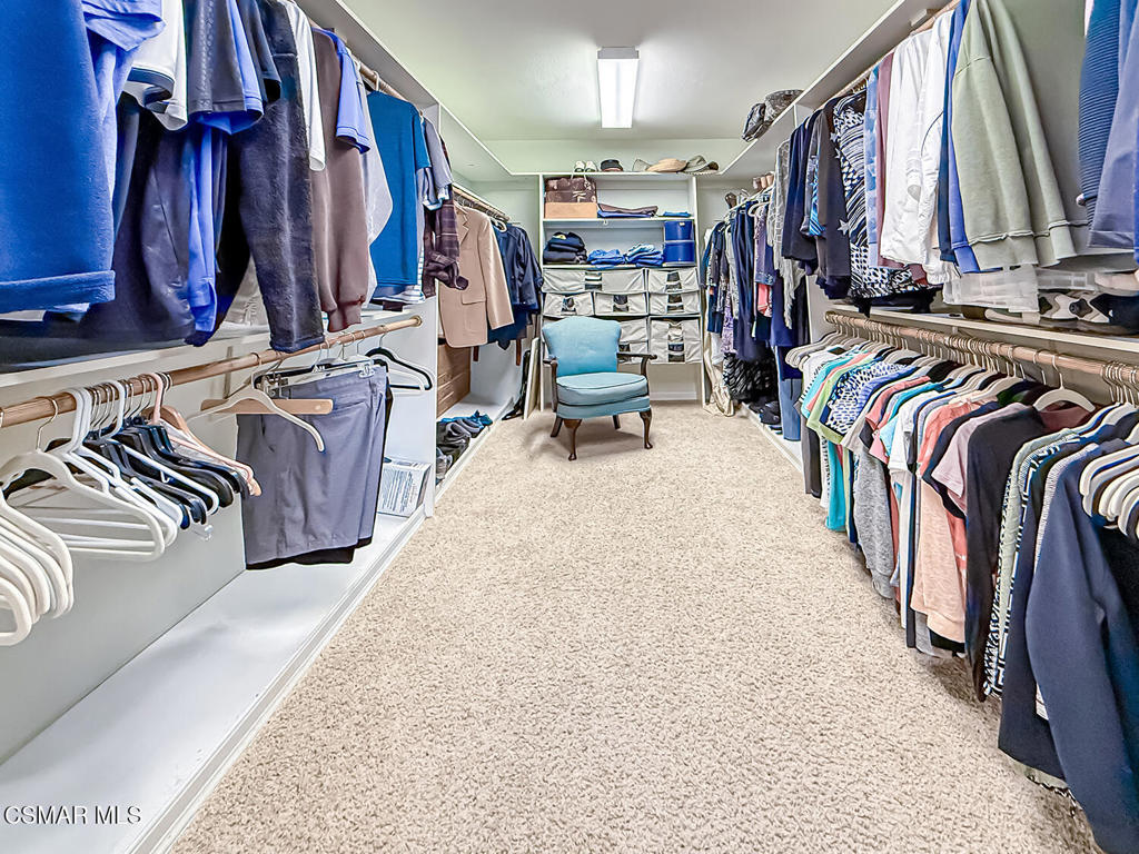 24525 Desert Avenue Newhall, CA 91321 - Photo 58 of 76 a view of walk in closet with clothes and shoes