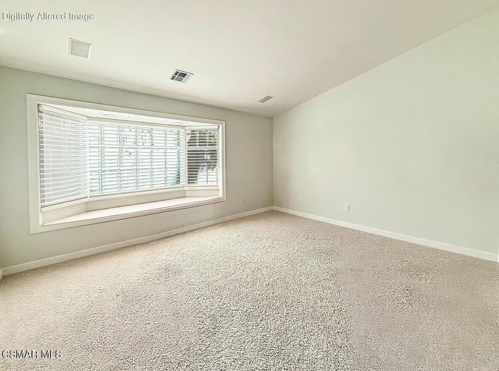 24525 Desert Avenue Newhall, CA 91321 - Photo 7 of 76 a view of an empty room with a window