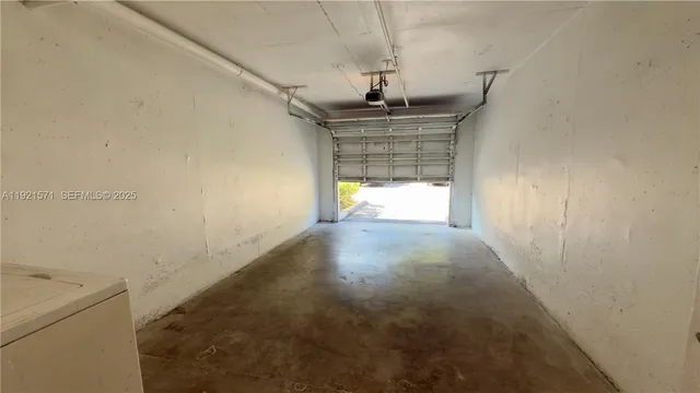 a view of hallway with a window