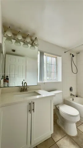 a view of a room with wooden walls