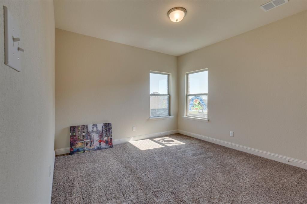 336 Red Hill Road Sunnyvale, TX 75182 - Photo 26 of 36 an empty room with windows