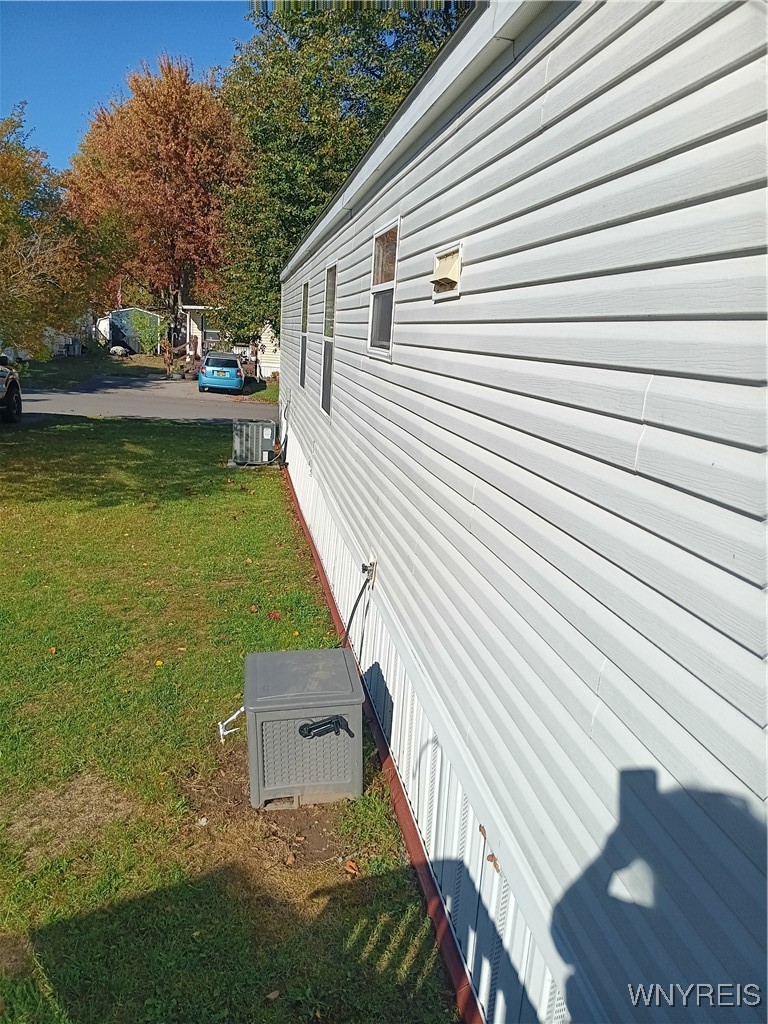 49 Sandy Brook Drive Hamlin, NY 14464 - Photo 11 of 45 exterior showing central air