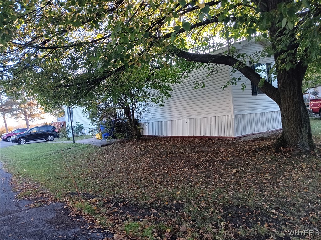 49 Sandy Brook Drive Hamlin, NY 14464 - Photo 6 of 45 corner side view of home
