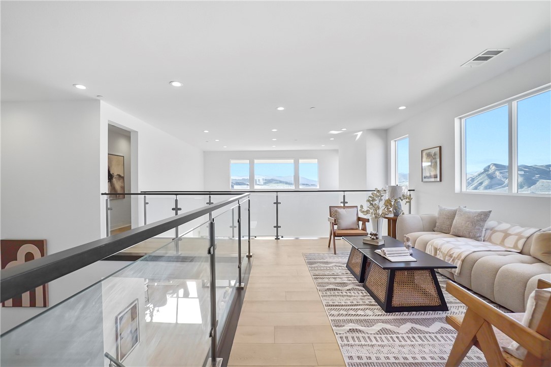27392 Dialogue Way Valencia, CA 91381 - Photo 24 of 62 a living room with furniture