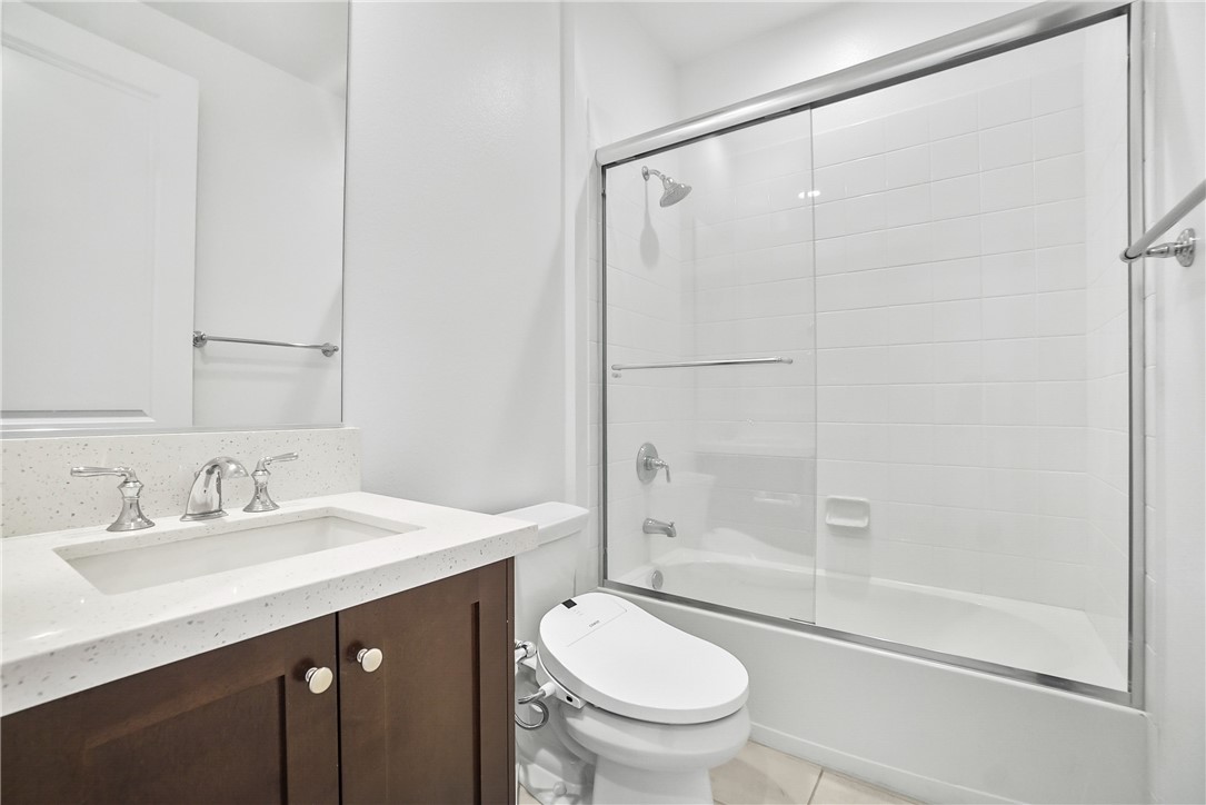 27392 Dialogue Way Valencia, CA 91381 - Photo 36 of 62 a bathroom with a sink and a mirror