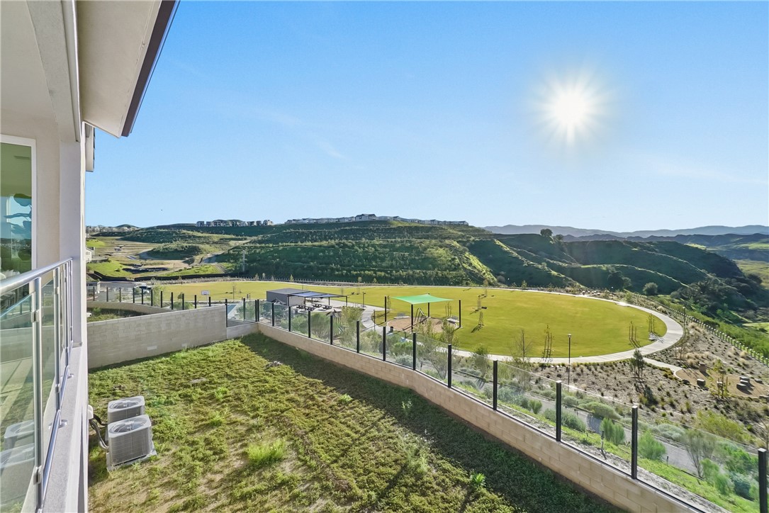27392 Dialogue Way Valencia, CA 91381 - Photo 46 of 62 a view of swimming pool with a terrace