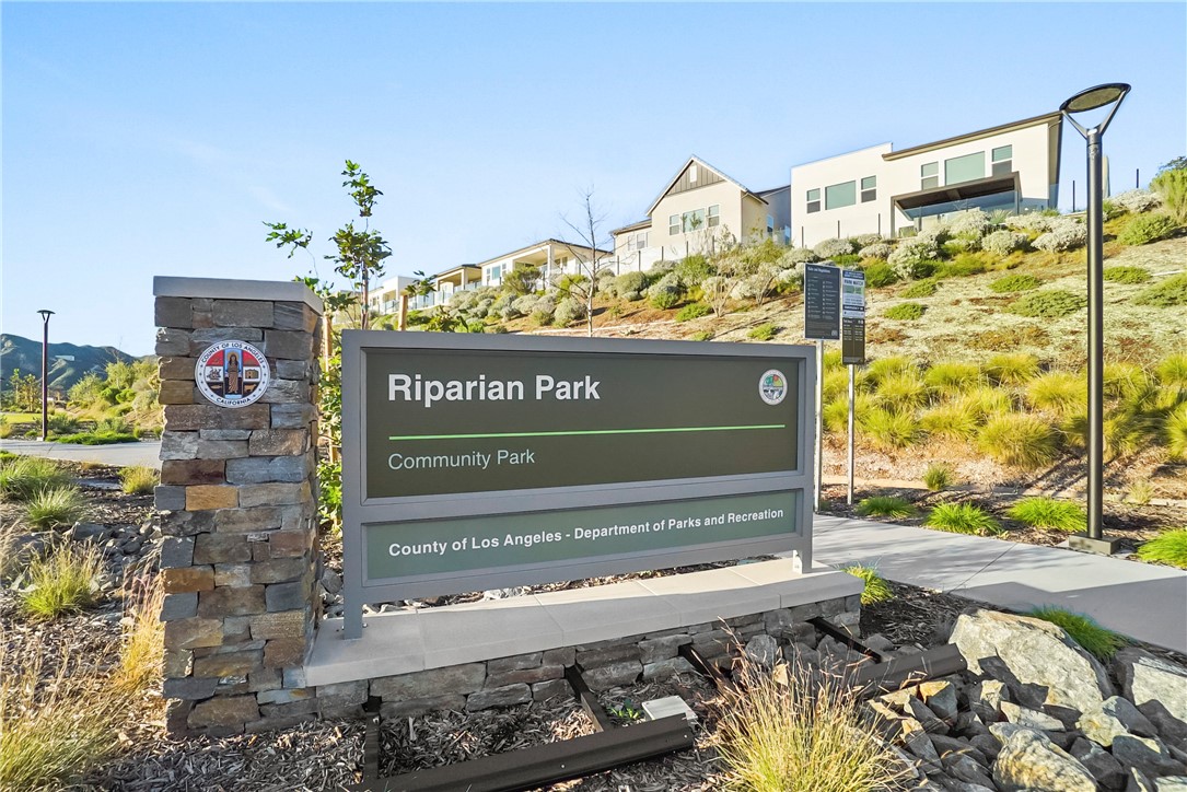 27392 Dialogue Way Valencia, CA 91381 - Photo 56 of 62 a sign on the side of a building