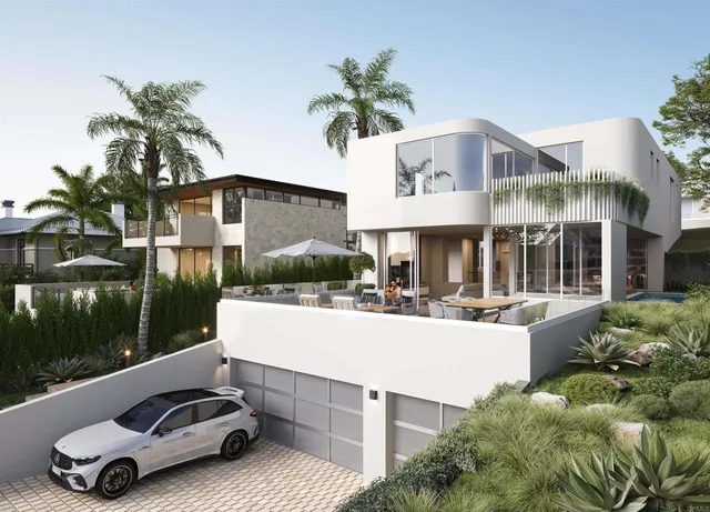a view of a patio with table and chairs potted plants