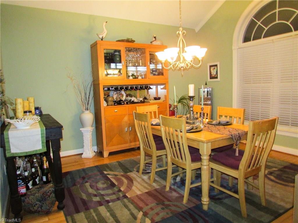 2791 Beckerdite Road Sophia, NC 27350 - Photo 6 of 25 Plenty of Space for Great Meals & Gatherings. This Big Airy Dining Room Features Hardwood Floors, Cathedral Ceiling & Floor to Ceiling Palladium Window,