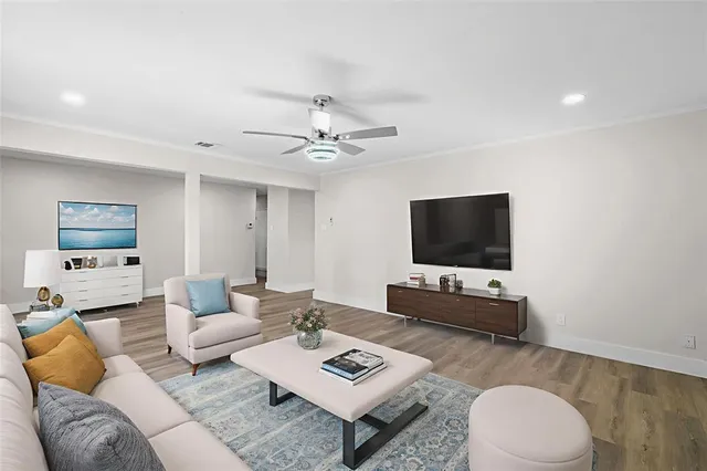 a kitchen with stainless steel appliances a sink stove and cabinets