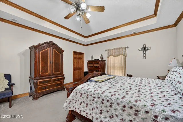 a bathroom with a double vanity sink mirror and shower