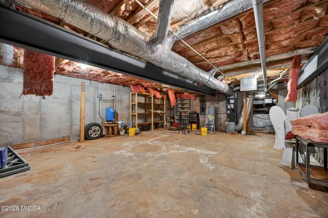 a view of entryway with brick walls