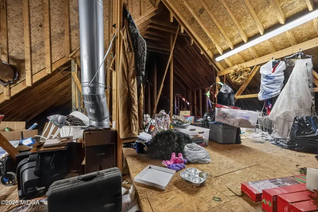 a view of house with trees in the background