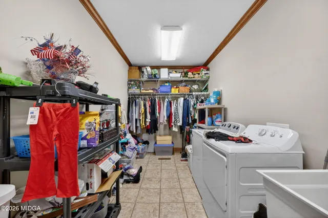 a view of a backyard with a tree