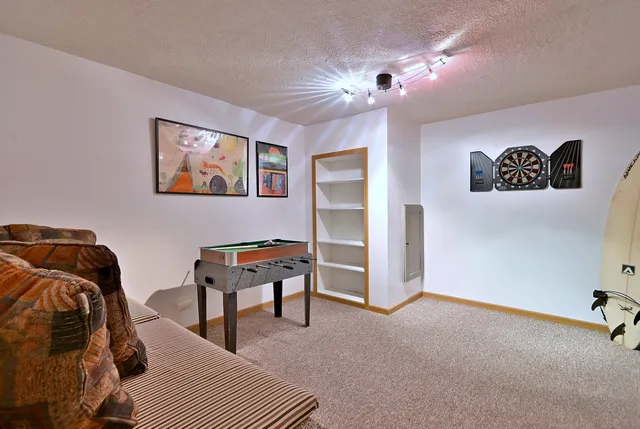 a bedroom with furniture and a bed