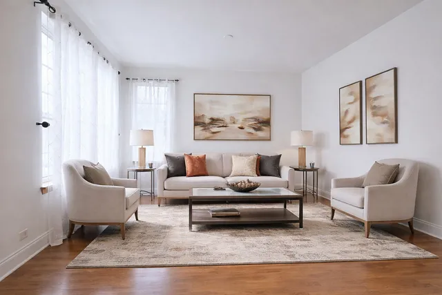 a living room with furniture and a rug