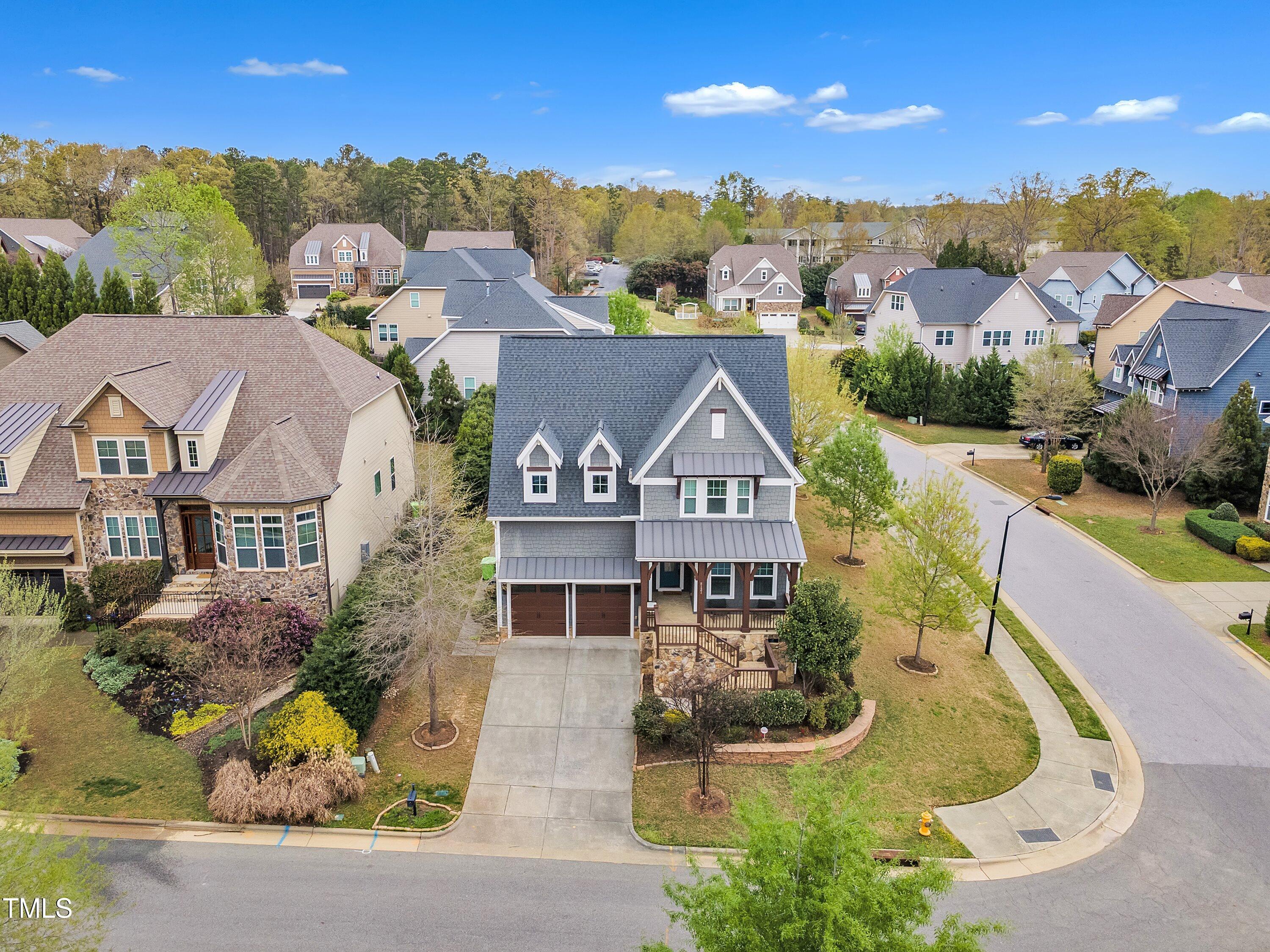 8121 Greys Landing Way Raleigh, NC 27615 - Photo 79 of 95 an aerial view of a house with a big yard