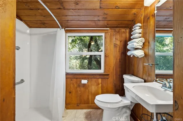 a white refrigerator freezer sitting inside of a kitchen