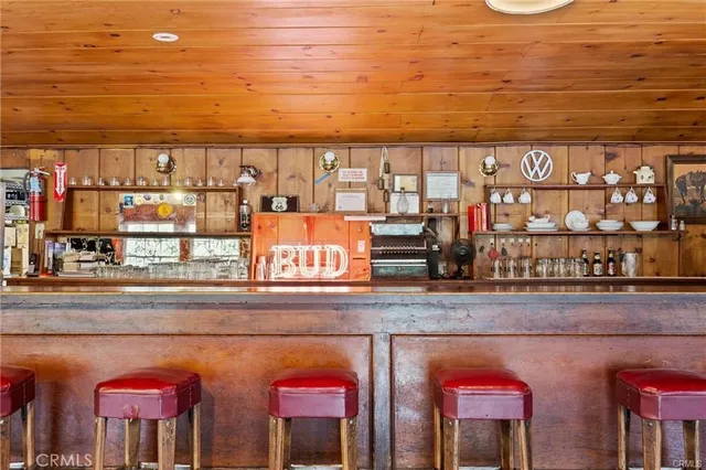 a view of a patio with table and chairs